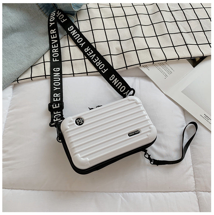 Mini suitcase in the shape of a shoulder bag