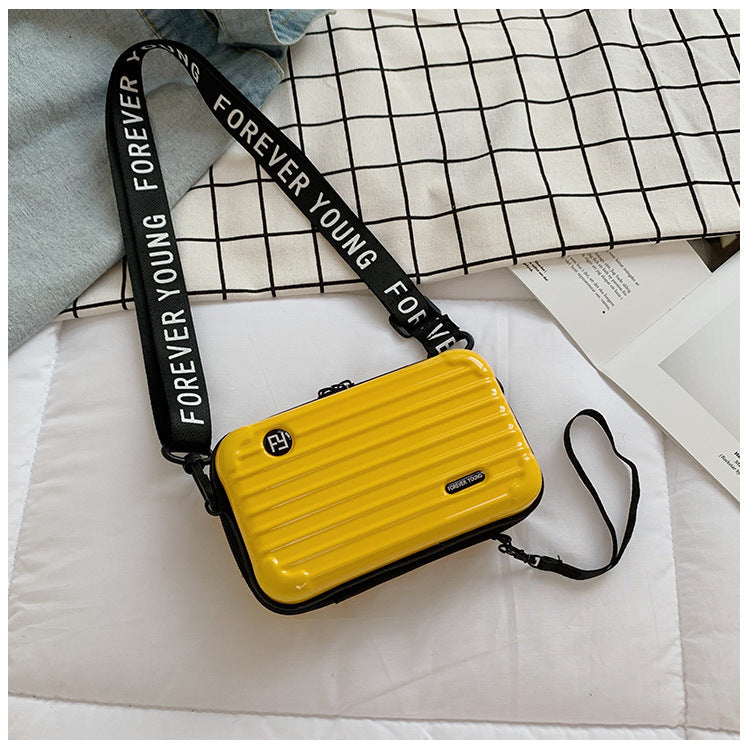 Mini suitcase in the shape of a shoulder bag