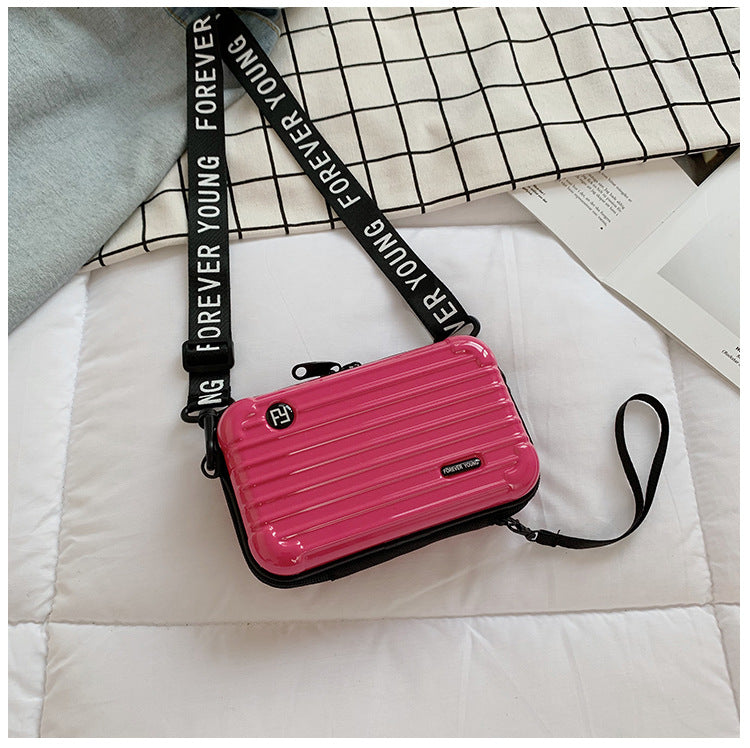 Mini suitcase in the shape of a shoulder bag