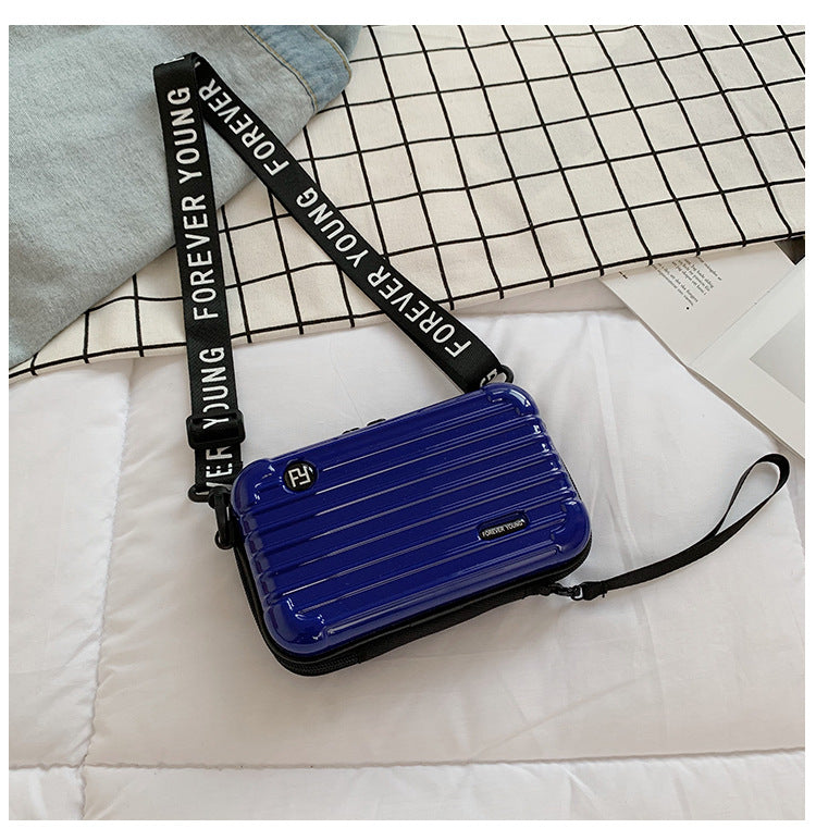 Mini suitcase in the shape of a shoulder bag